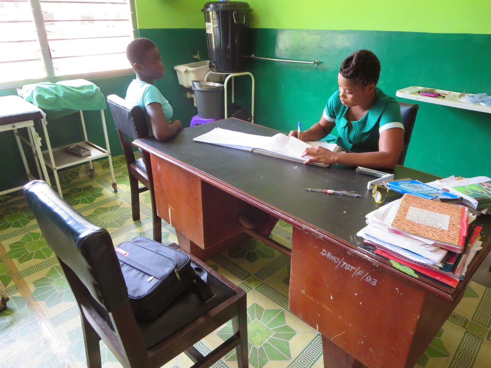 Nurse taking OPD records